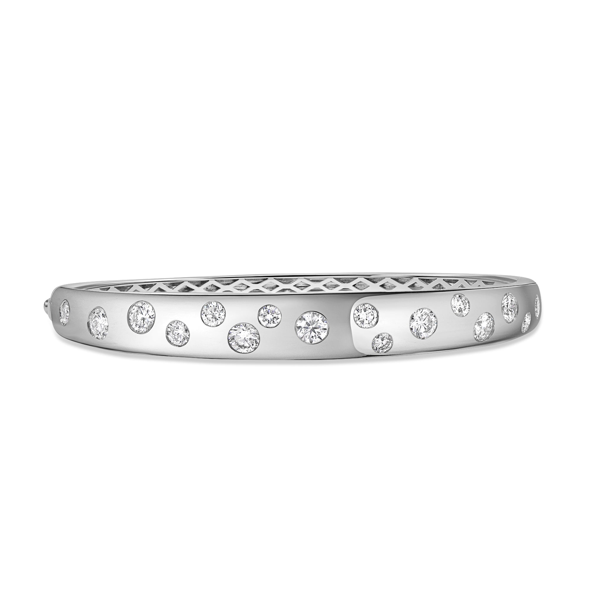 Luxurious diamond bangle with scattered round diamonds in a bold 14K gold silhouette.