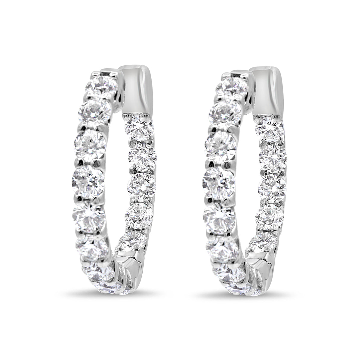 1-inch diamond hoop earrings available in 18K white, yellow, or rose gold, featuring 28 round brilliant diamonds totaling 4.71 carats.