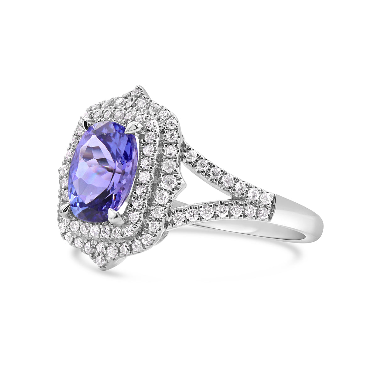 14K gold double halo tanzanite ring with a 1.67 carat tanzanite and sparkling round diamonds.