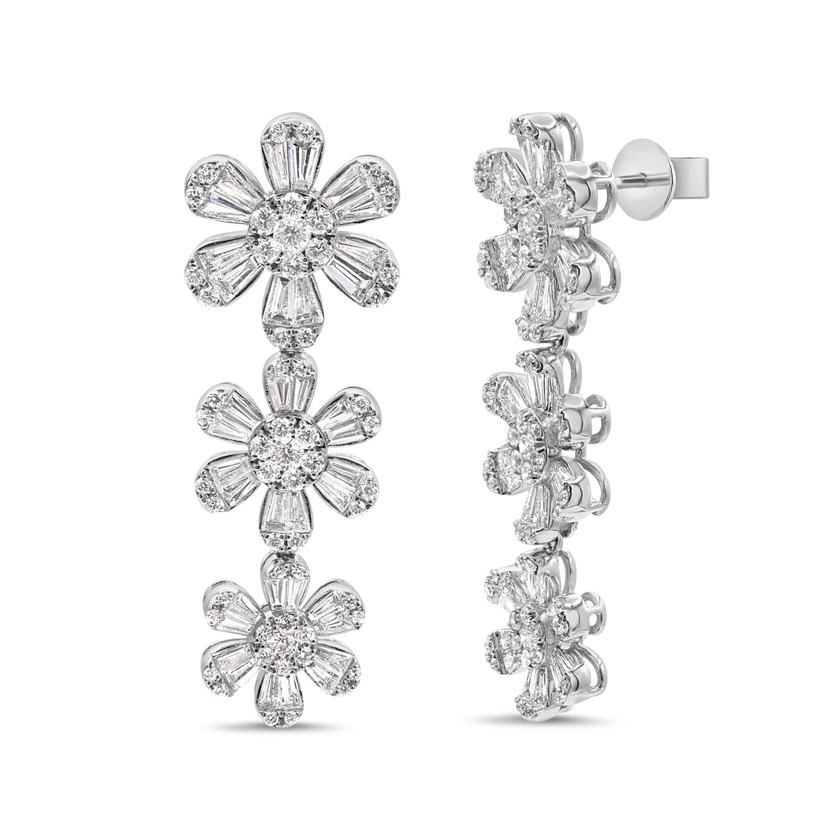 14K gold three flower diamond drop earrings featuring 3.36 carats of baguette and round diamonds.