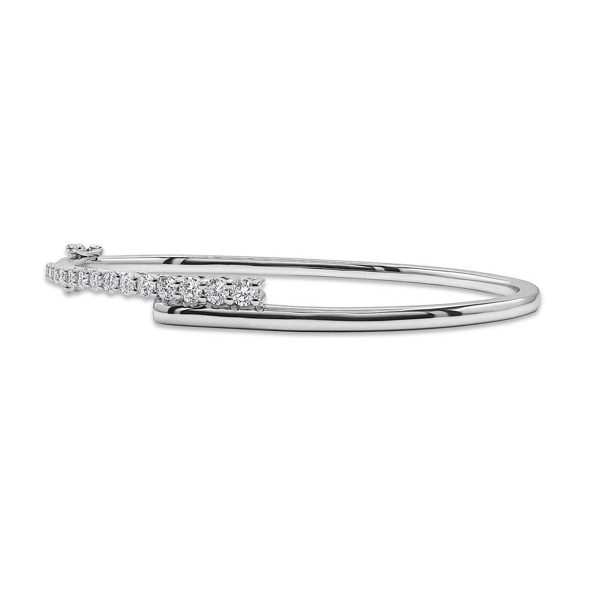 14K white gold bangle with 15 prong-set round diamonds totaling 1.04 CTW.