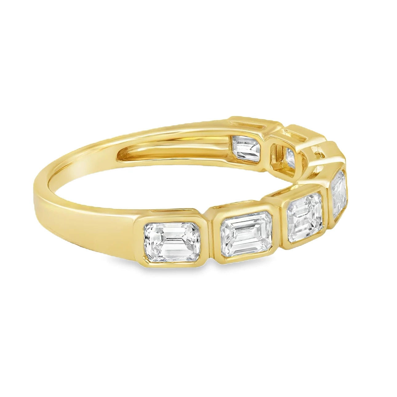 18K emerald cut diamond half bezel east-west band featuring emerald cut diamonds in a sleek modern setting.
