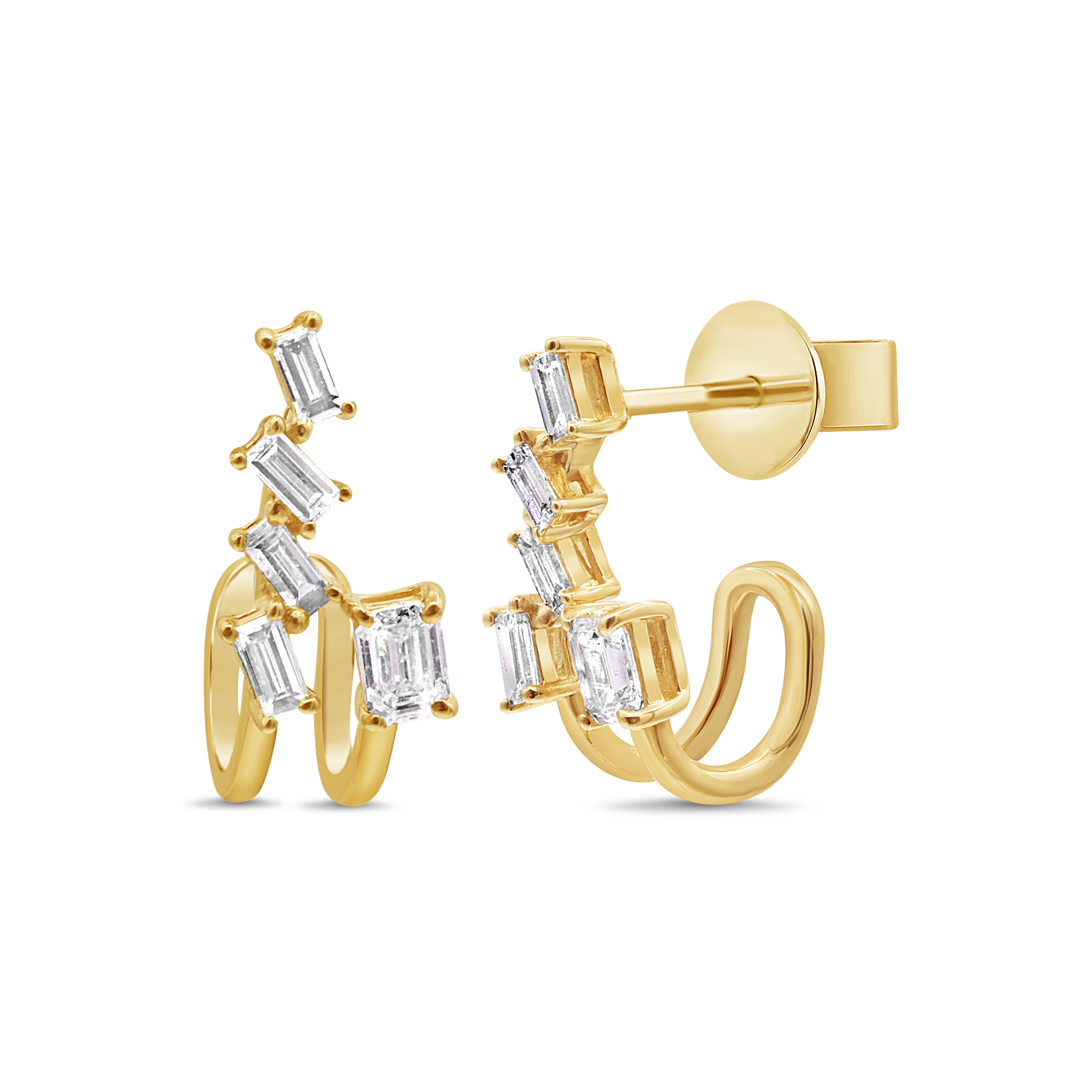 Baguette and emerald waterfall diamond earrings in 14K yellow gold featuring baguette and emerald cut diamonds in a cascading design.