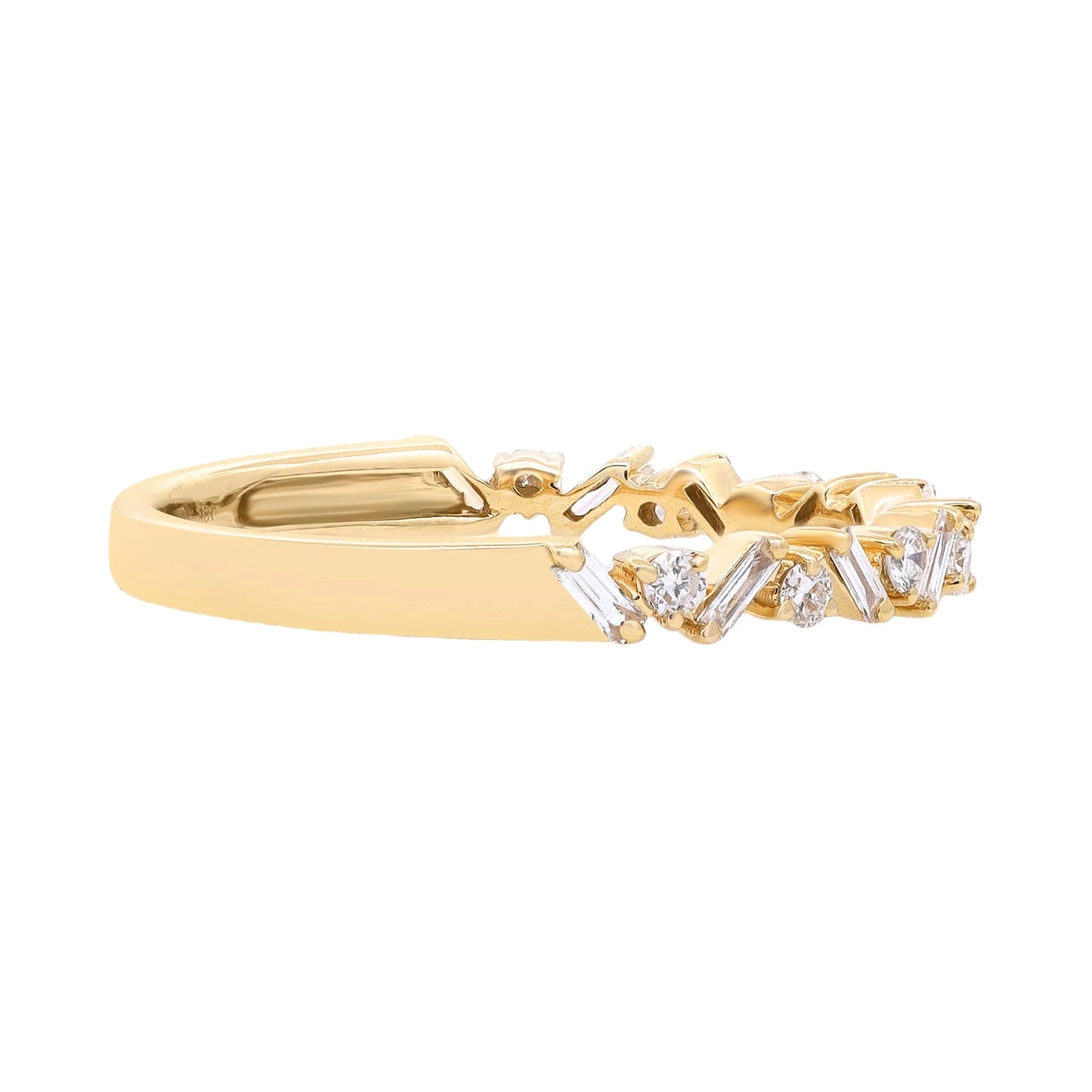 Floating round and baguette diamond band in 18K yellow gold featuring mixed-cut diamonds in a modern stacking design.