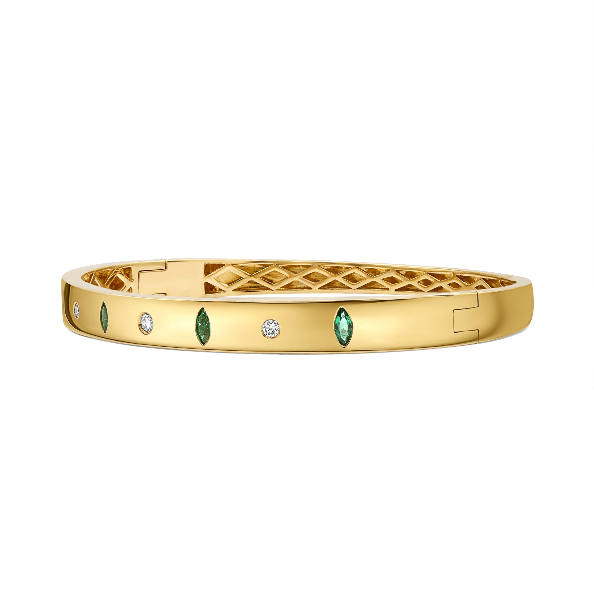 14K gold bangle featuring green emeralds and round diamonds in a sleek inlay and prong-set design.