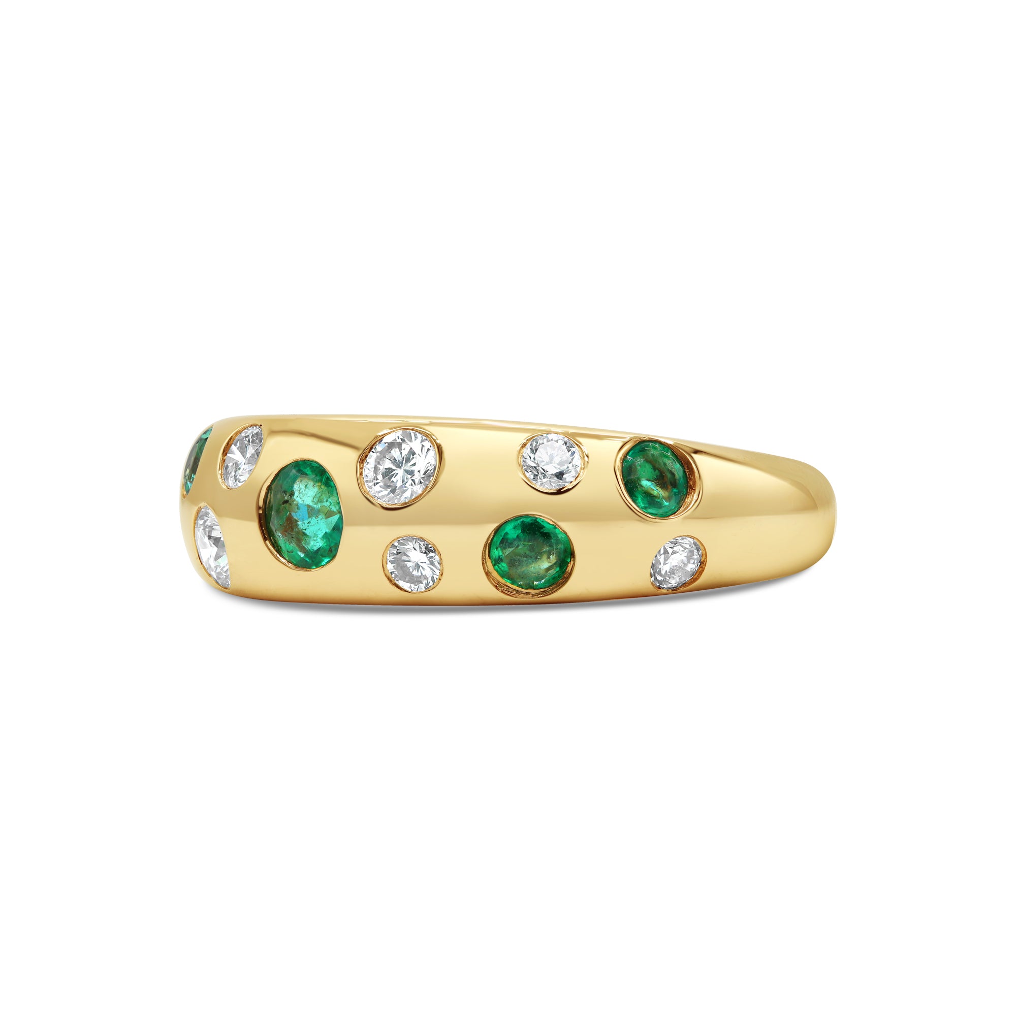 Green emerald and diamond inlay dome ring in 18K gold featuring alternating emeralds and round diamonds in a modern polished design.