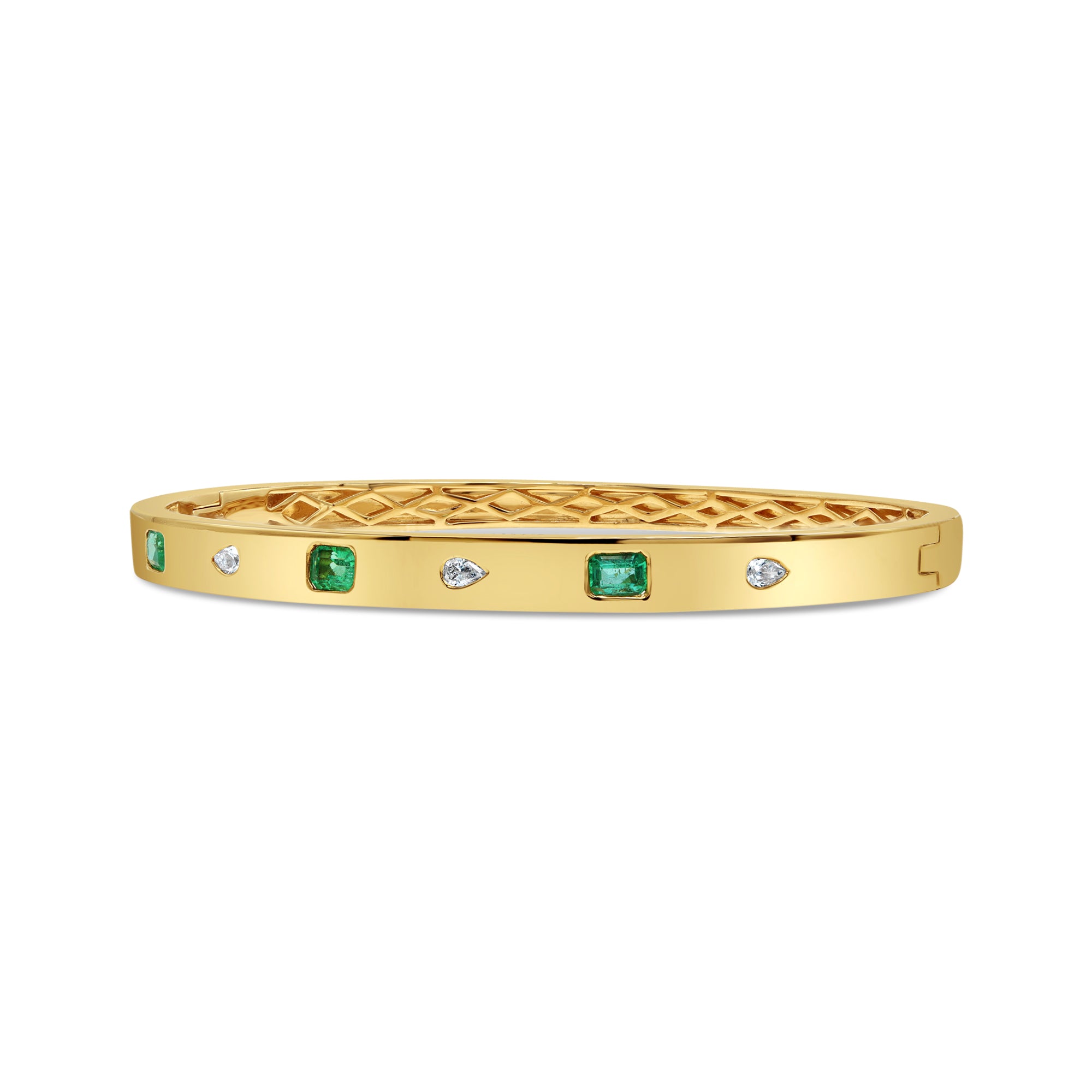 Green emerald and pear diamond inlay bangle in 14K gold featuring alternating gemstone accents in a modern, minimalist design.