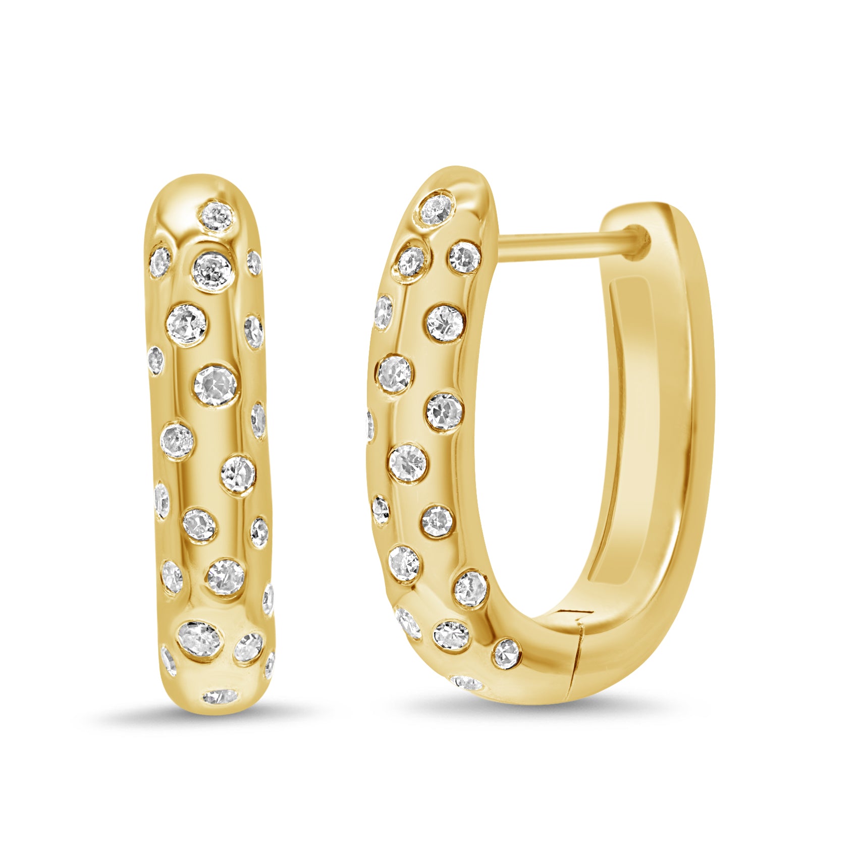 Inset diamond huggie earrings in 14K yellow gold featuring round brilliant diamonds in a sleek, modern design.
