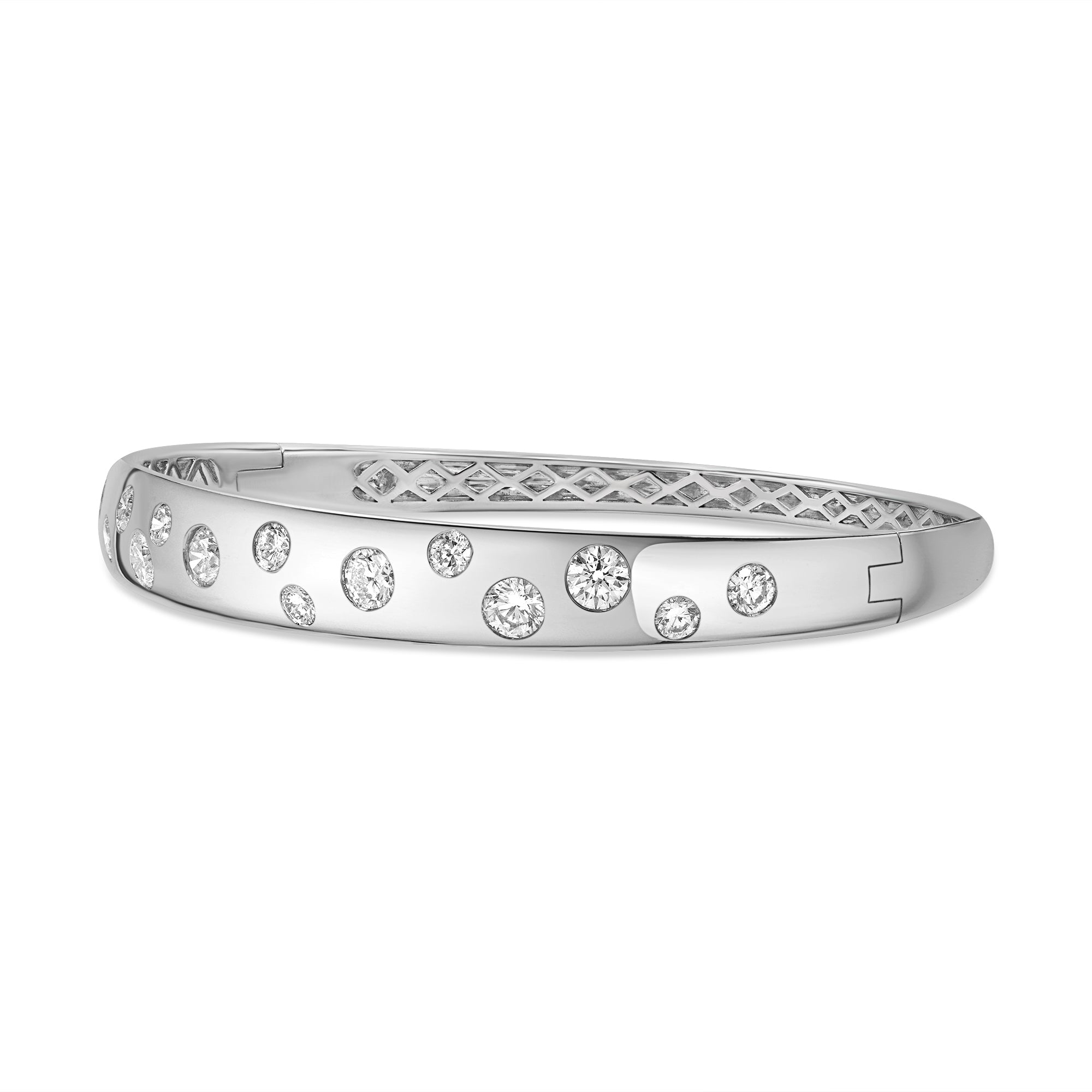 14K gold bangle featuring scattered prong-set round diamonds in a sleek modern design.