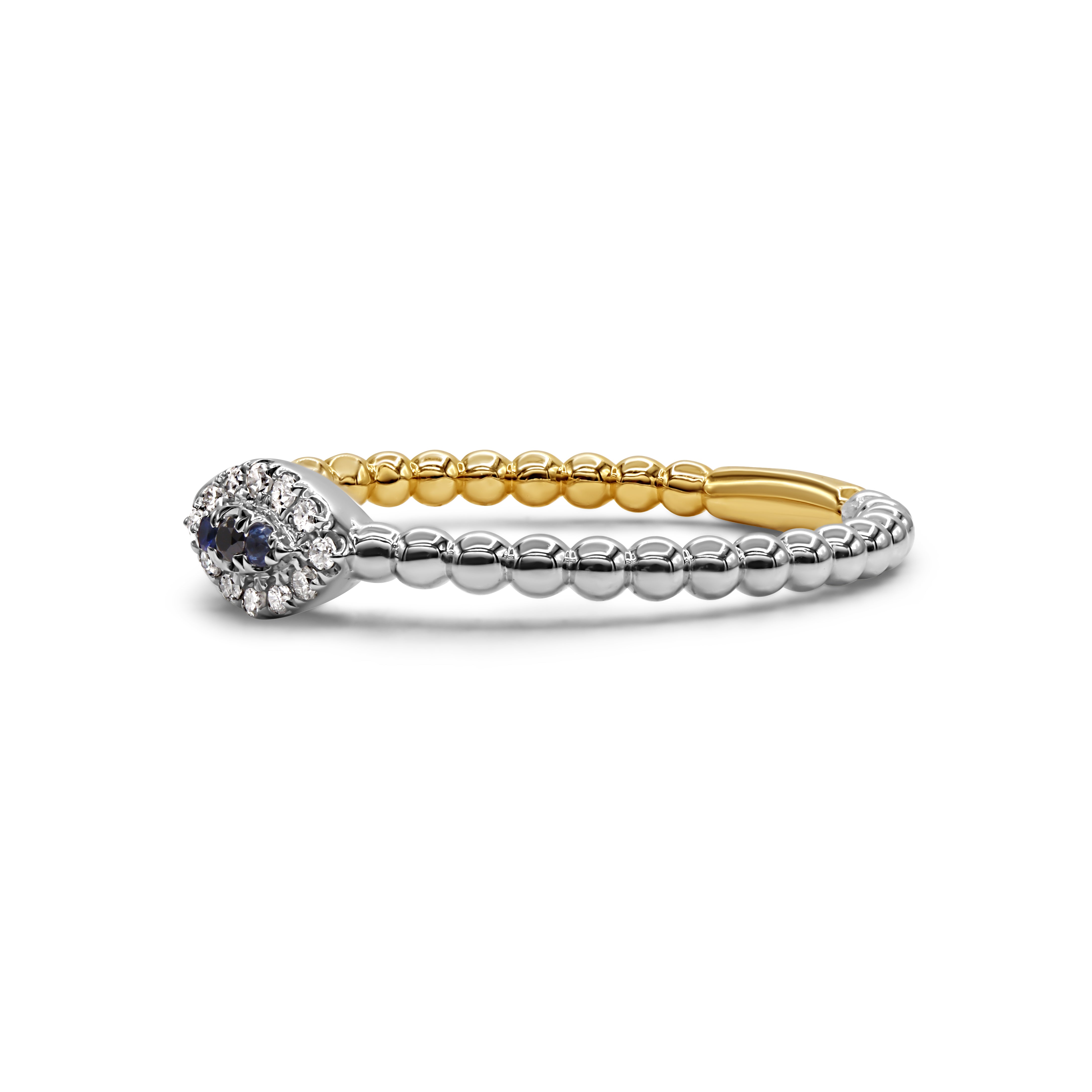 Two-tone gold evil eye ring featuring a beaded design in a modern, symbolic style.