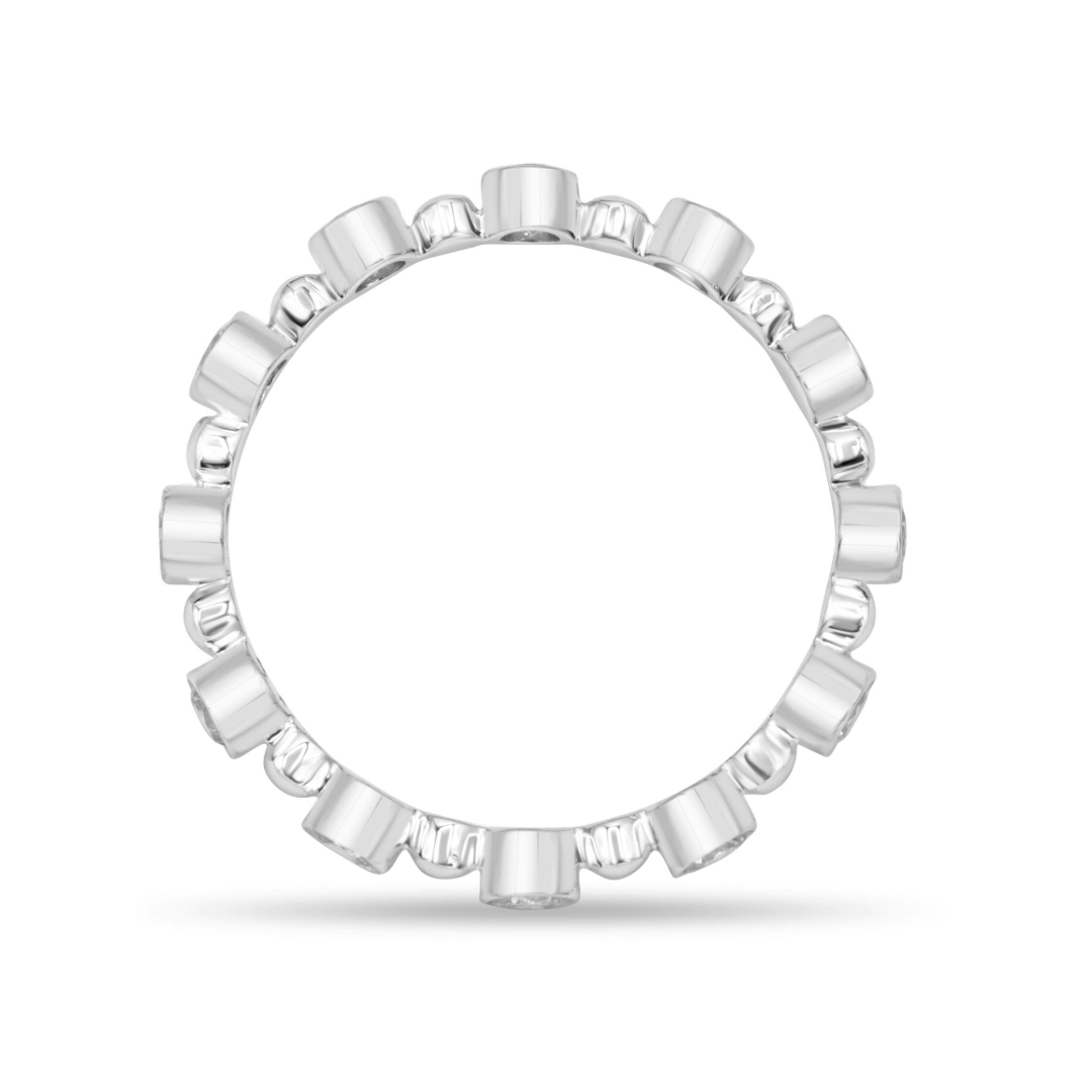 18K gold bezel and bead diamond eternity band with 12 round brilliant diamonds totaling 4.08 carats.