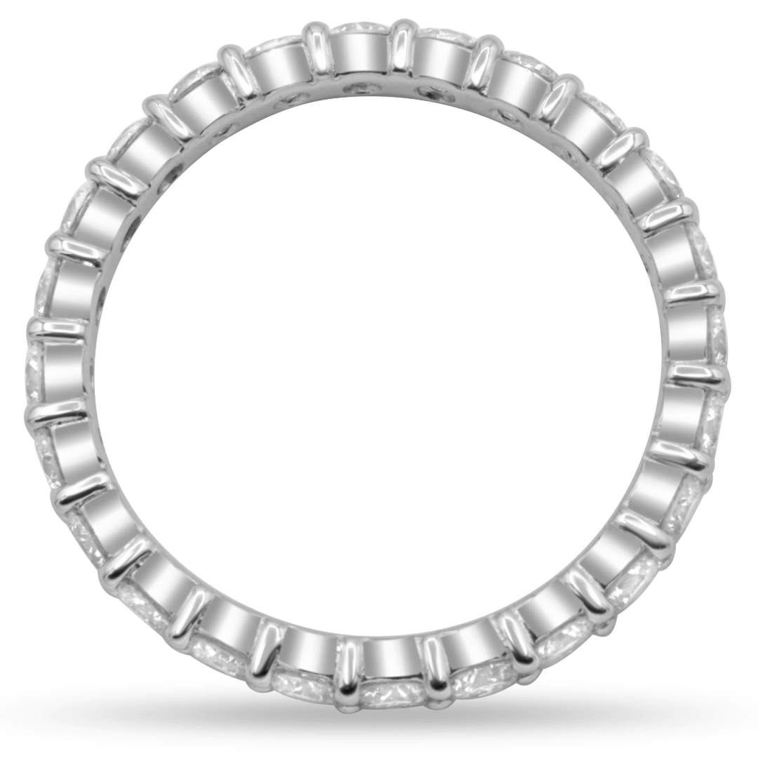 Platinum diamond eternity band featuring 24 brilliant round diamonds totaling 1.19 carats.