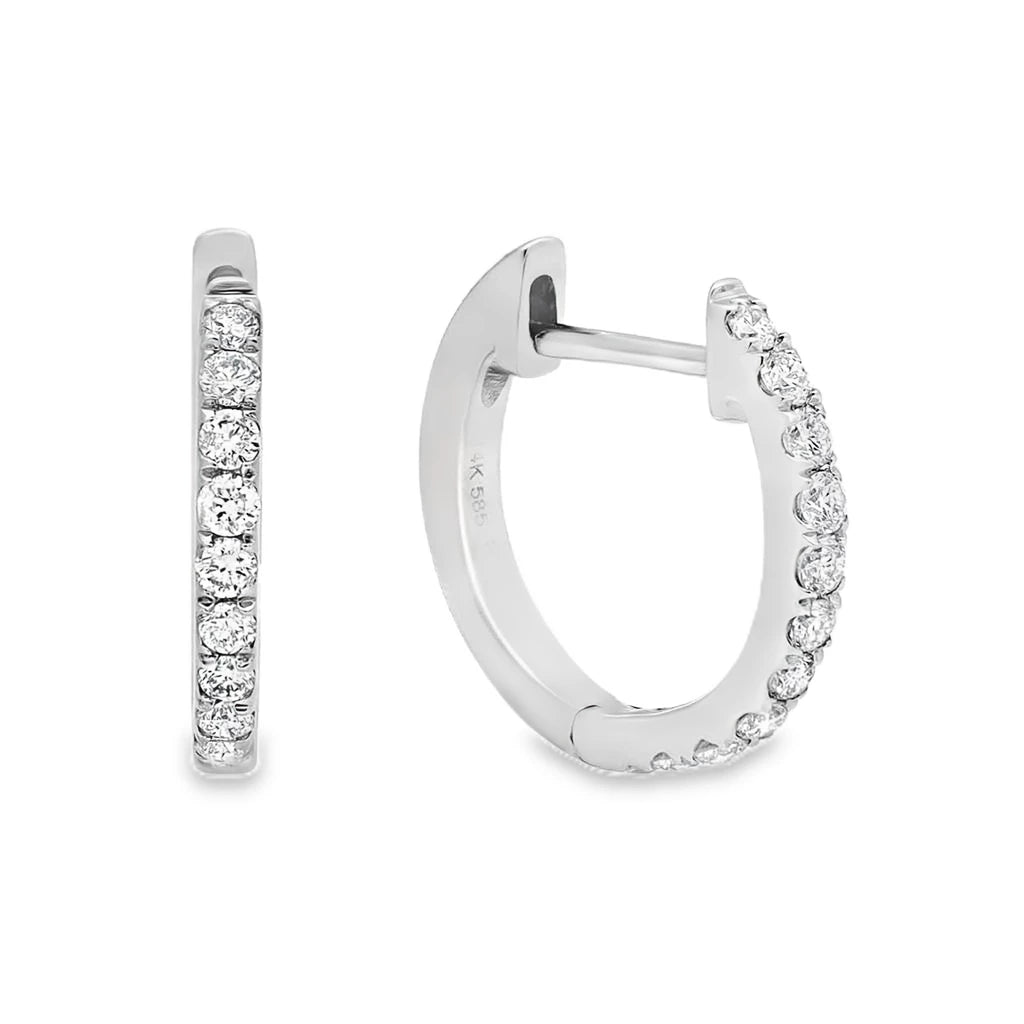 14K yellow and white gold petite huggie earrings featuring diamonds with G-H color and SI clarity for a timeless look.